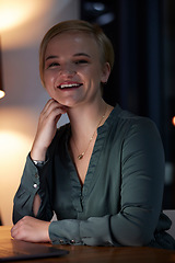 Image showing Night, smile and portrait of woman in office for business, overtime and corporate vision. Happy, professional and management with employee working at desk for goals, future and confident in company
