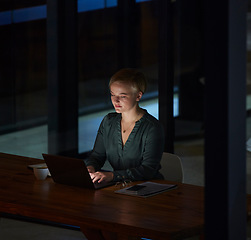 Image showing Night, laptop and typing with woman in office for planning, overtime and corporate strategy. Deadline, technology and email with employee at desk for business proposal, online trading and internet