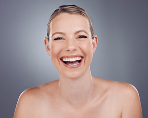 Image showing Skincare, portrait and woman laughing in studio for beauty, dermatology and wellness cosmetics on background. Happy mature female model, smile face and aesthetic shine of facial transformation glow