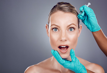 Image showing Needle, scared woman and portrait for skincare, collagen or beauty process in studio. Cosmetics, surprise face and injection of plastic surgery, botox facial change or aesthetic prp implant on mockup