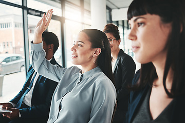 Image showing Question, workshop and woman in meeting, conference or seminar in office corporate training session. Vote questions, group audience or business people or employee with hand up for learning new skills