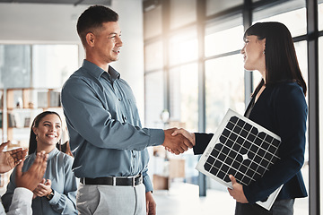 Image showing Technician, deal and solar panels with people and handshake for renewable energy, teamwork and engineering. Future, technology and applause with group cheering for photovoltaic, product and success