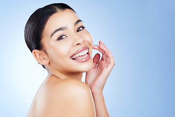 Image showing Skin care, beauty and portrait of woman with mockup space for happy glow results. Face of aesthetic model person with facial cosmetics or makeup for health, wellness and dermatology blue background