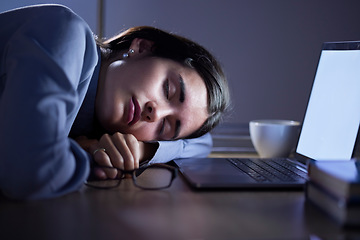 Image showing Tired, sleep and business woman in office resting after working on laptop mockup at night. Sleeping, relax and female employee with fatigue, burnout or exhausted, overworked and nap, asleep or sleepy