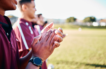 Image showing Sports, closeup and hands with team, applause and celebration for winning, victory and happiness. Zoom, group and players on field, joyful and cheerful for teamwork, success and achievement outdoor