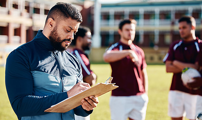 Image showing Fitness, rugby and coach with clipboard, teamwork and training for competition, workout and wellness. Male, trainer and group with healthy lifestyle, sports and practice for exercise, support or plan