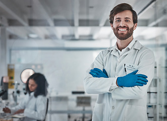 Image showing Scientist, portrait and man in lab with science and research for medical innovation or biotechnology with chemistry. Scientific study, doctor in laboratory with leadership and arms crossed