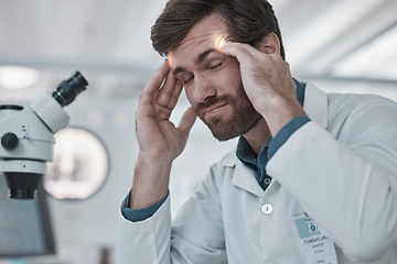 Image showing Stress, doctor or scientist with headache in a laboratory suffering from burnout, migraine pain or overworked. Exhausted, frustrated or tired man working on science research with fatigue or tension