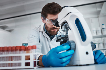 Image showing Working in laboratory, man studying chemical dna in test tube and research scientific biotechnology in Germany. Pathology scientist, liquid solution and microscope focus on career in medical science