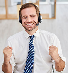 Image showing Success, crm happiness and portrait of business man in call center with smile from promotion. Happy, consulting and winning achievement of a contact us telemarketing employee excited from bonus