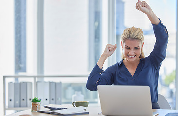 Image showing Business woman, laptop and celebration for winning, promotion or victory bonus at office desk. Happy female employee celebrating win, deal or discount on sales or good news on computer at workplace