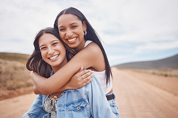 Image showing Portrait, hugging and friends on a road trip with mockup on a dirt path outdoor in nature for adventure together. Desert, freedom or hug with a young woman and friend outside for summer travel