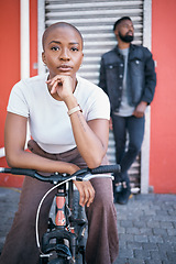 Image showing Bicycle, portrait and couple of friends for city travel, streetwear fashion and urban gen z lifestyle. Face of a confident black woman or cool people with a bike in urban sidewalk for youth cycling