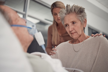 Image showing Sad family, old woman and man in bed at hospital with ventilator for breathing, healthcare or support. Senior wife, husband and deathbed with cancer in lungs at clinic, mother and daughter solidarity