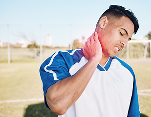 Image showing Fitness, field and man with neck pain, injury or accident from soccer match, exercise or training. Sports, workout and male football player with medical emergency or muscle sprain at outdoor stadium.
