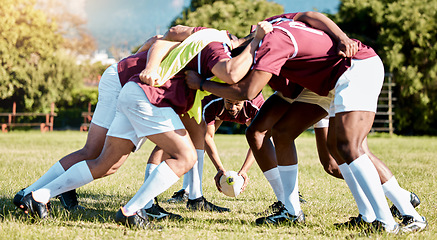 Image showing Rugby scrum, sports team and grass field exercise of training sport group outdoor. Teamwork, fitness and solidarity of men in a huddle for cardio, strength and game challenge with commitment