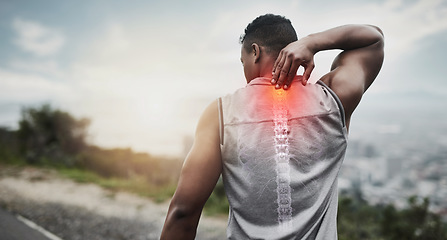 Image showing Fitness, athlete and man with back pain, injury or accident while running in nature on mountain. Sport, workout and male runner training for marathon, race or competition with outdoor cardio exercise