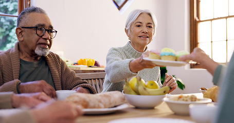 Image showing Cup cake, tea party and group of senior people in the living room of a community home for a social. Friends, retirement or conversation with elderly men and women together in an apartment for a visit