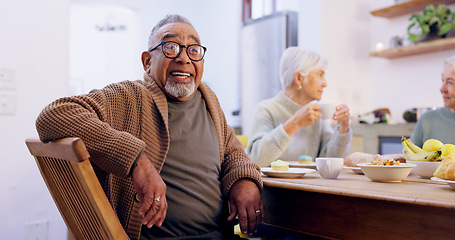 Image showing Retirement, tea party and a group of senior people in the living room of a community home for a social. Friends, smile or conversation with elderly men and women together in an apartment for a visit