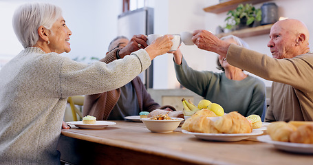 Image showing Cheers, tea party and a group of senior people in the living room of a community home for a social. Friends, toast or celebration with elderly men and women together in an apartment for a visit