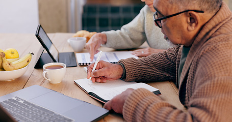 Image showing Couple, notebook and insurance for planning in retirement, invest and bills or documents. Senior people, marriage and communication or discussion for future, saving and finance in kitchen with laptop