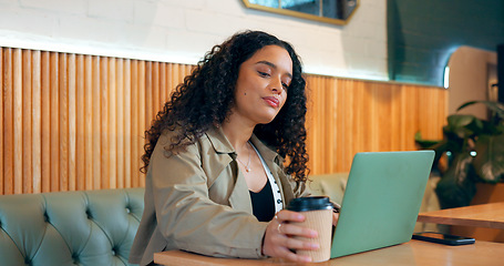 Image showing Woman, coffee and laptop in cafe for remote work, research or networking for business with web. Face, person and reading with technology in restaurant for copywriting, internet and freelancer