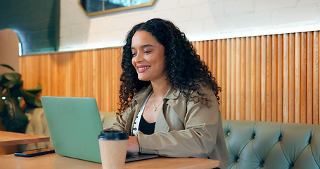 Image showing Smile of woman in cafe, typing on laptop and remote work, reading email or writing blog, article or research on internet. Computer, happy freelancer and copywriting in coffee shop at restaurant table