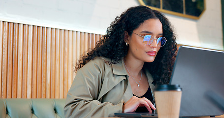Image showing Cafe, thinking and woman with a laptop, ideas and connection with inspiration, glasses and planning. Person, freelancer and entrepreneur with a pc, coffee shop or project with copywriting or email