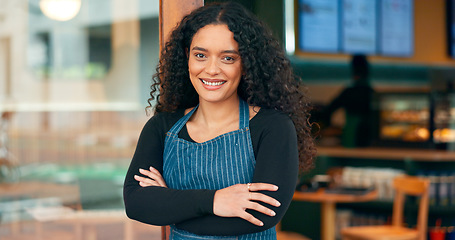 Image showing Businesswoman, coffee shop and arms crossed with smile, manager and startup for store, cafe or restaurant. Portrait, entrepreneurship or waitress for retail, proud or confident at door, happy or open