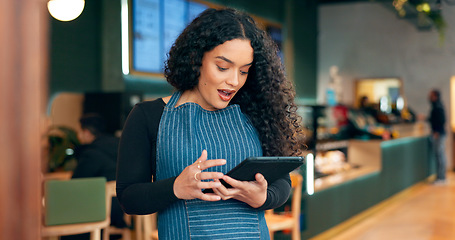 Image showing Surprise, restaurant or barista on tablet for small business owner, social media update or sales promotion. Waitress, wow or woman reading news on technology for coffee shop order in cafe review