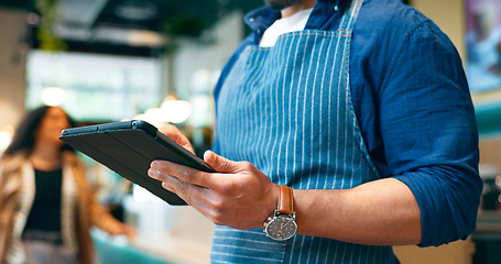Image showing Business owner, hands and tablet for cafe or restaurant marketing, online management and customer services. Barista, waiter or person typing on digital technology for coffee shop data or check profit