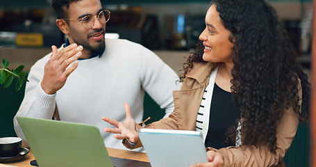 Image showing Coworkers, laptop and remote work with discussion, working and technology for business, strategy and plan. Cafe, meeting and brainstorming for project, woman and man in partnership, smile and job