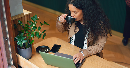 Image showing Woman, remote work and coffee shop with laptop, drink and scroll with reading, data analysis or thinking. Journalist, freelancer and ideas with computer, cafe or process for story, news or research