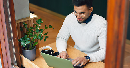 Image showing Cafe, thinking and man with a laptop, typing and connection with inspiration, copywriting and planning. Person, freelancer or entrepreneur with a pc, coffee shop or project with creativity or startup