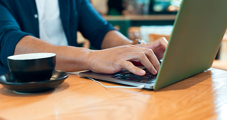 Image showing Hands typing, laptop and coffee shop for remote work, online research and planning for marketing project. Person, customer or freelancer at cafe or restaurant with internet, computer and research