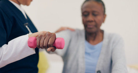 Image showing Caregiver, elderly woman or dumbbell on bed to help, exercise or wellness in physiotherapy. Nurse, black person or fitness in bedroom in physical therapy, senior patient or healthcare in retirement