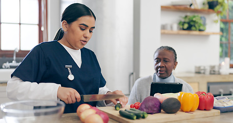 Image showing Nurse, cooking and senior woman in home with healthy food, vegetables and nutrition in healthcare. Retirement, caregiver and helping elderly person in kitchen with diet and online recipe on tablet