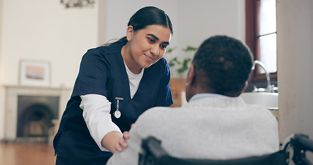 Image showing Consultation, healthcare and nurse with patient in a wheelchair for discussion at nursing home. Medical career, conversation and young female caregiver talking to woman with disability in her house.