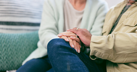 Image showing Love, closeup and senior couple holding hands in living room at home for marriage together. Support, comfort and elderly man and woman with affection for relationship in the lounge at modern house.