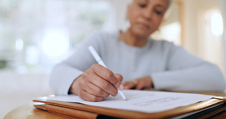 Image showing Senior woman, sign and writing with documents, paperwork and application for life insurance policy. Person, hand and checklist for compliance, investment or will in retirement with signature in home