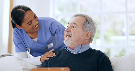 Image showing Senior man, nurse and retirement home with kindness, smile and couch with touch, care and help. Happiness, healthcare and elderly for nursing, friendly and retired for support, respect and caregiver