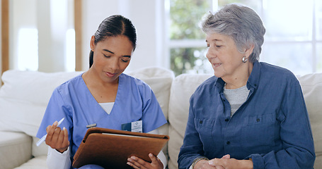 Image showing Writing, consulting and nurse with senior woman on sofa for medical care, support and service. Healthcare, retirement and caregiver with elderly patient documents for insurance, diagnosis and report