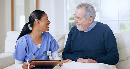 Image showing Writing, consulting and nurse with senior man on sofa for medical care, support and service. Healthcare, retirement home and caregiver with elderly patient documents for insurance, checkup and report