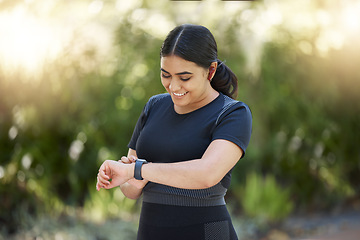 Image showing Woman, smartwatch and nature park running training, cardio exercise and fitness health with smile. Happy outdoor sport workout progress, real plus size and healthy runner progress with time stopwatch