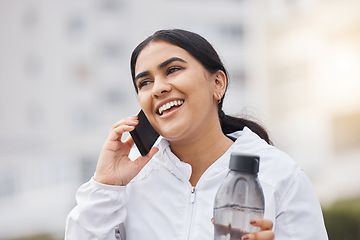 Image showing Woman, phone call and fitness to relax, with water bottle and smile outdoor, exercise and conversation on break. Smartphone, connect and fresh female workout, talking and happy to rest and wellness.