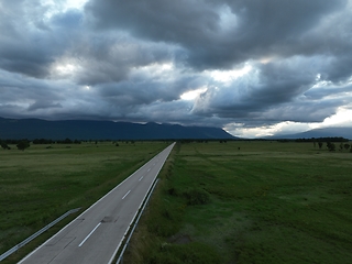 Image showing Aerial shot of an empty country road