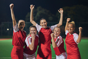 Image showing Soccer, winning team, and women celebrate win and teamwork on soccer field. Success, sports and proud girls in group portrait together, winner football team from Brazil on grass at night soccer game.