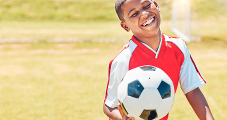 Image showing Happy, soccer and child on sport field with soccer ball excited for training, game or competition with smile. Black kid, football and health of young athlete on grass ready to play match for fitness.