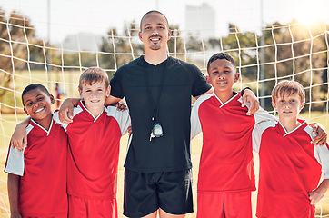 Image showing Soccer, football coach and kids team stand in goal post for team solidarity, tournament game and teamwork to play a competitive match. Happy sports players, soccer field and sport group collaboration