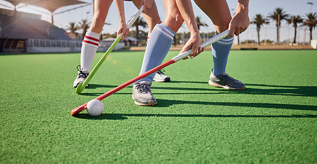 Image showing Sport, hockey and athlete legs on field playing game and fitness people workout, competition and exercise outdoor. Sports match, hockey player competitive and active life with training at stadium.